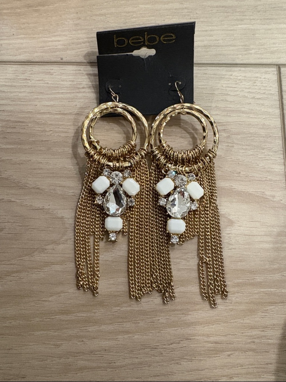 bebe Gold and White Fringe Chandelier Earrings